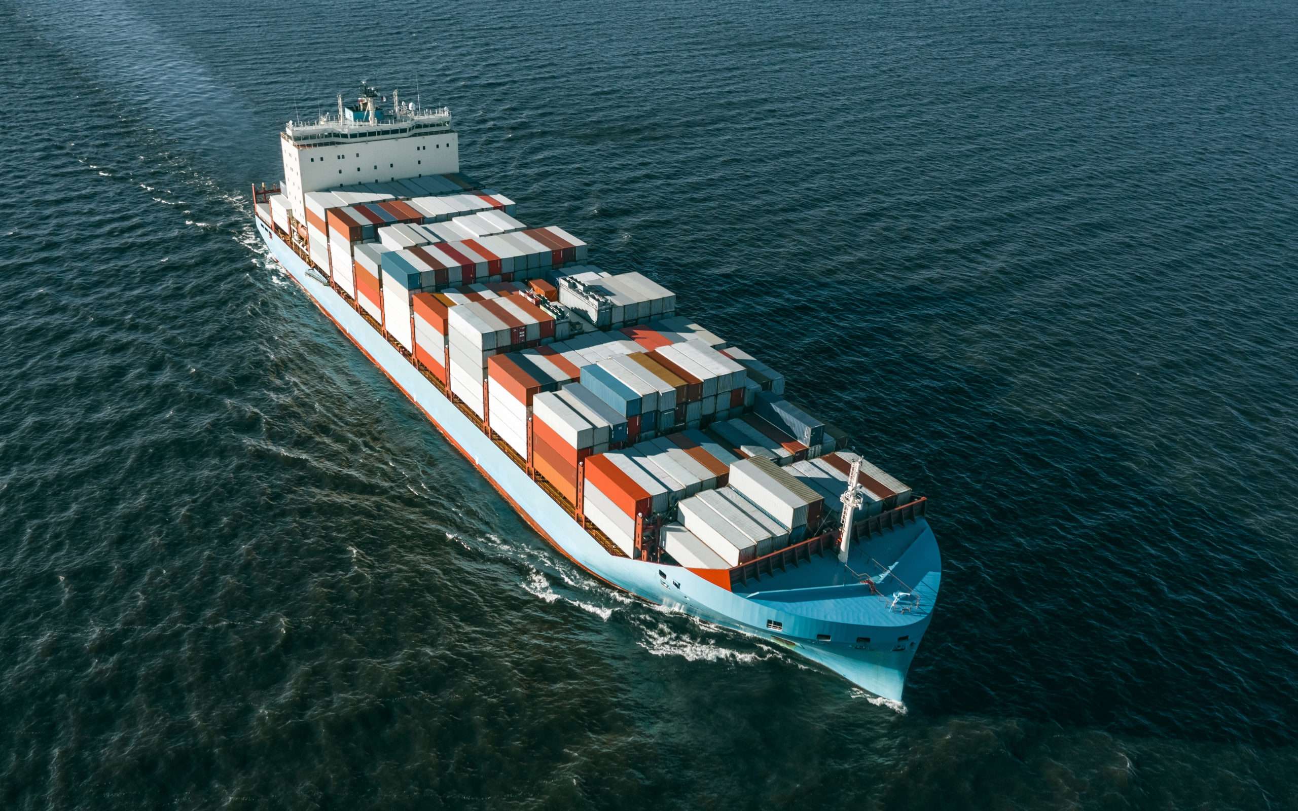 High angled view of cargo vessel in the sea